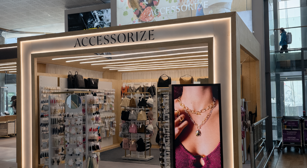 Facade image of Accessorize featuring products and a large commercial screen at the front.