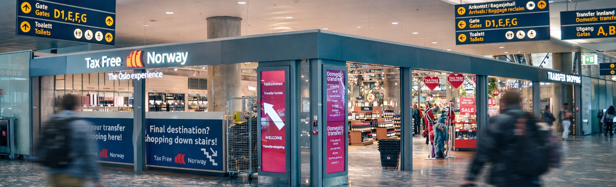 Airport duty-free shop and transfer area at Oslo Airport with travelers and directional signs to gates and toilets