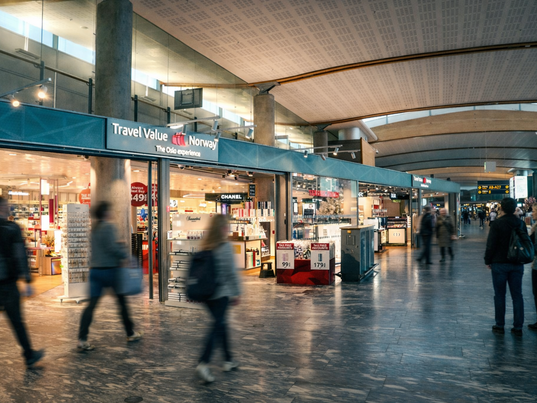 A person browsing a display of various sunglasses in a store, featuring stylish frames with tinted lenses